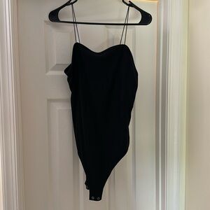 Black Body Suit. Spaghetti strap body suit. Never worn!